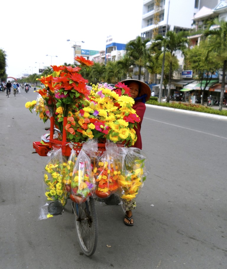 Cyklende blomsterhandler i Saigon.